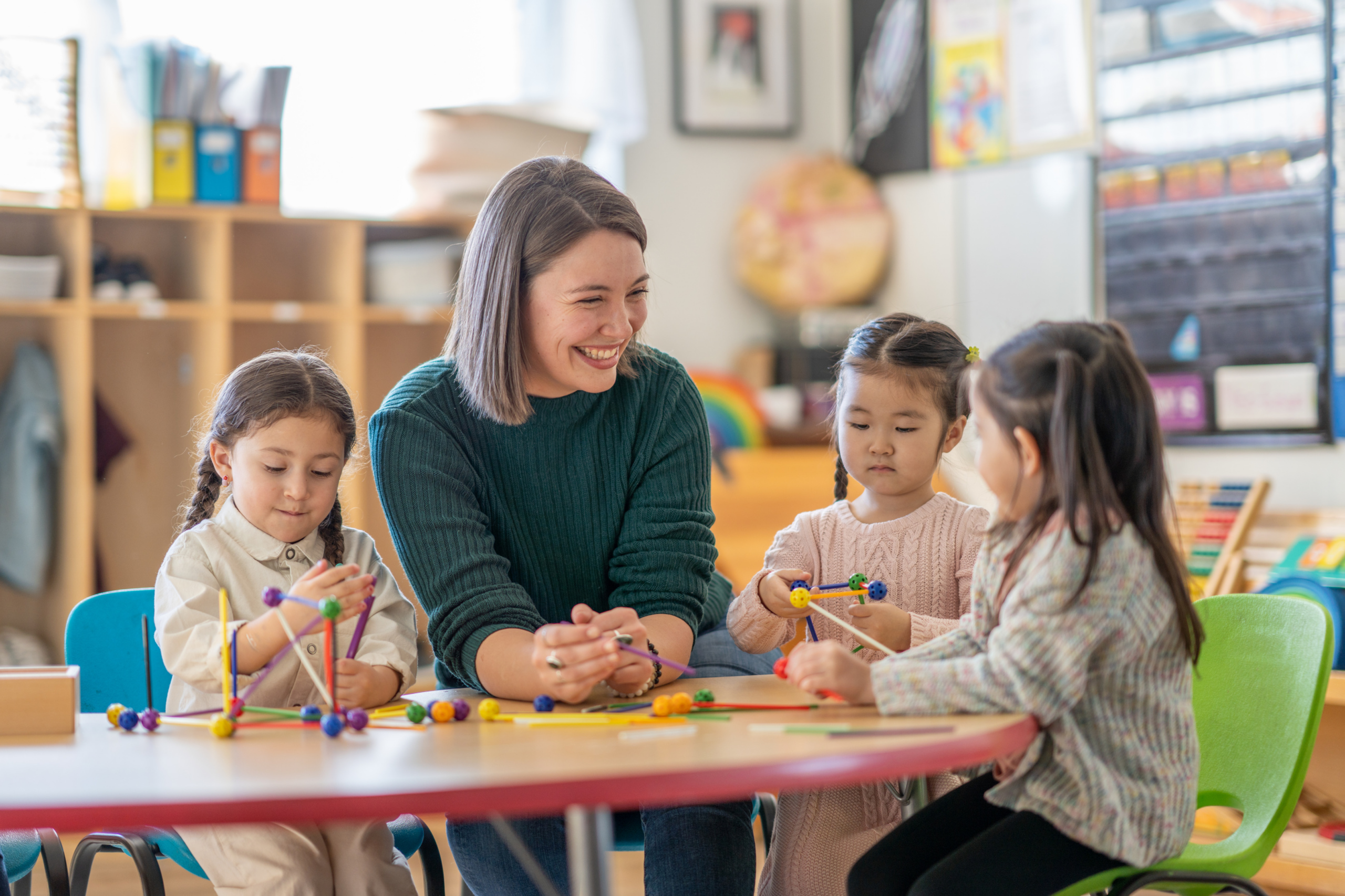 Childcare educator with children