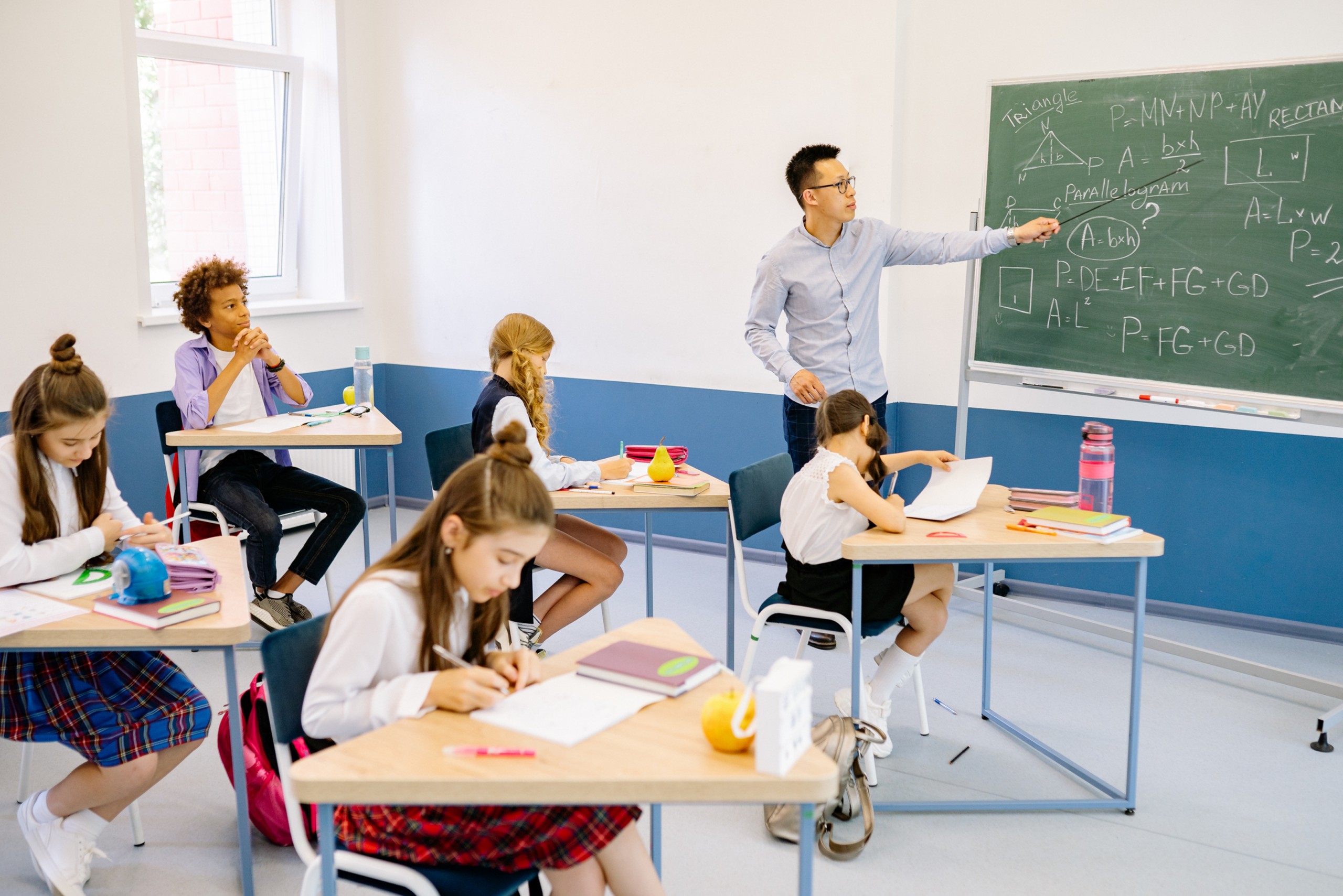 Teacher at blackboard